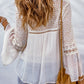 Eyelet Tassel Tie Flare Sleeve Blouse