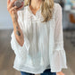 Eyelet Tassel Tie Flare Sleeve Blouse